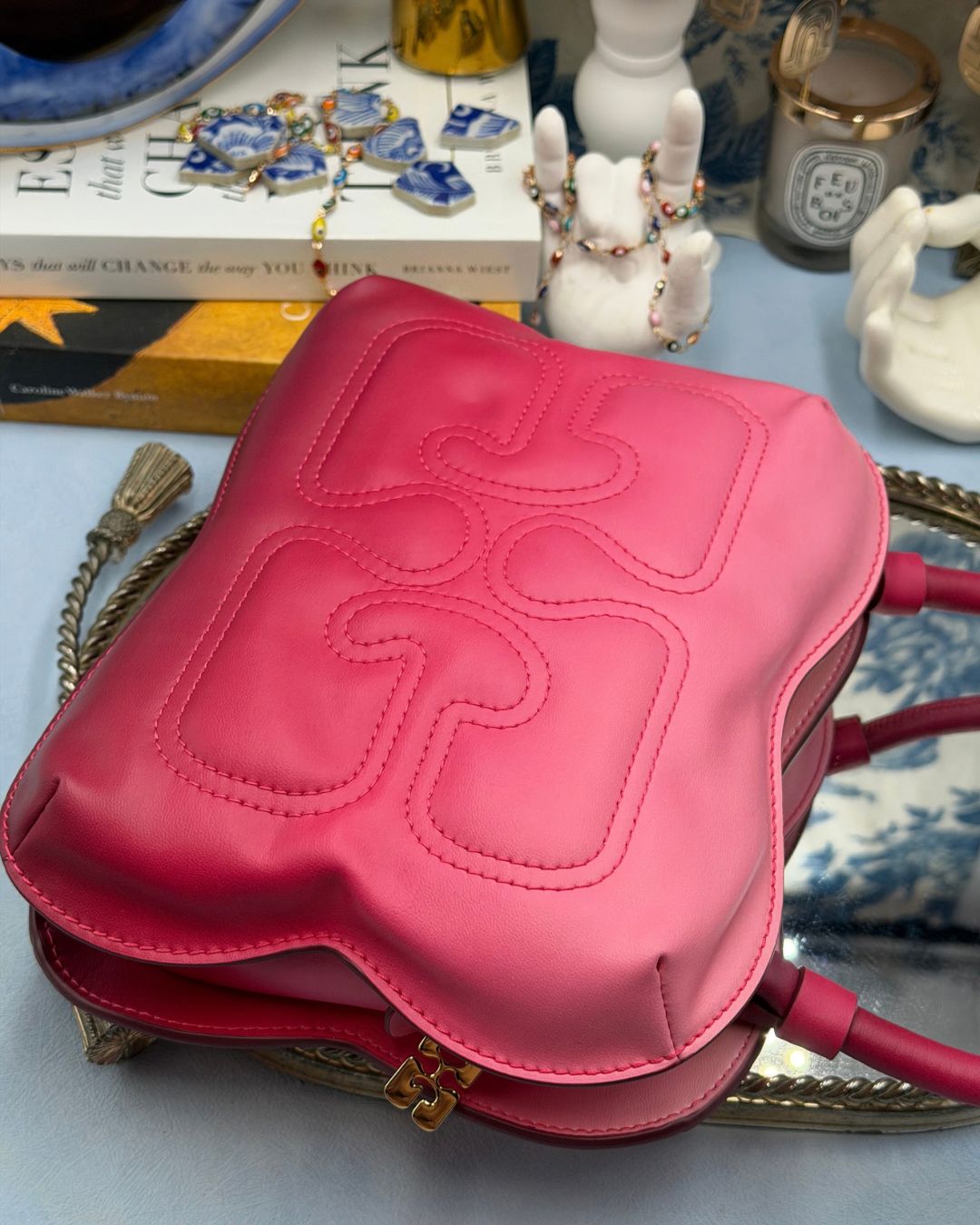 Embroidered GANNI logo and padded recycled-leather construction in Pink Gradient