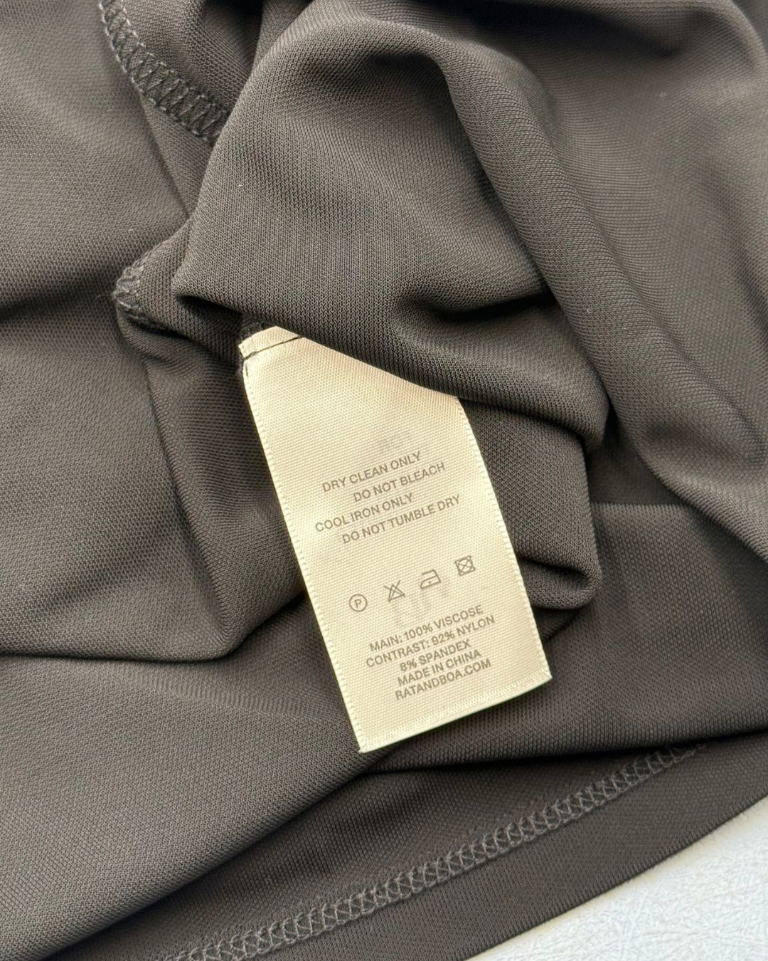 Composition and care label on RAT & BOA Selma Dress