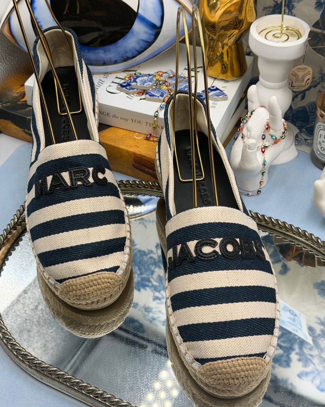 Front view of MARC JACOBS blue and ivory striped canvas espadrilles