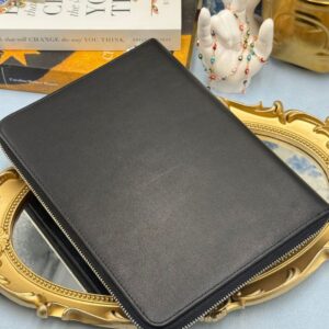 ack of ALEXANDER McQUEEN Skull embossed leather portfolio with silver-tone hardware