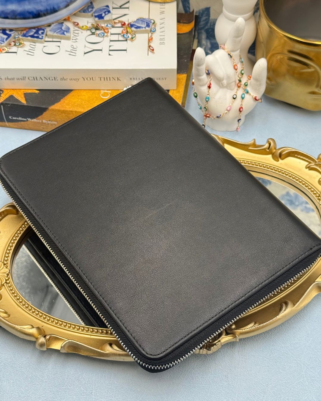 ack of ALEXANDER McQUEEN Skull embossed leather portfolio with silver-tone hardware