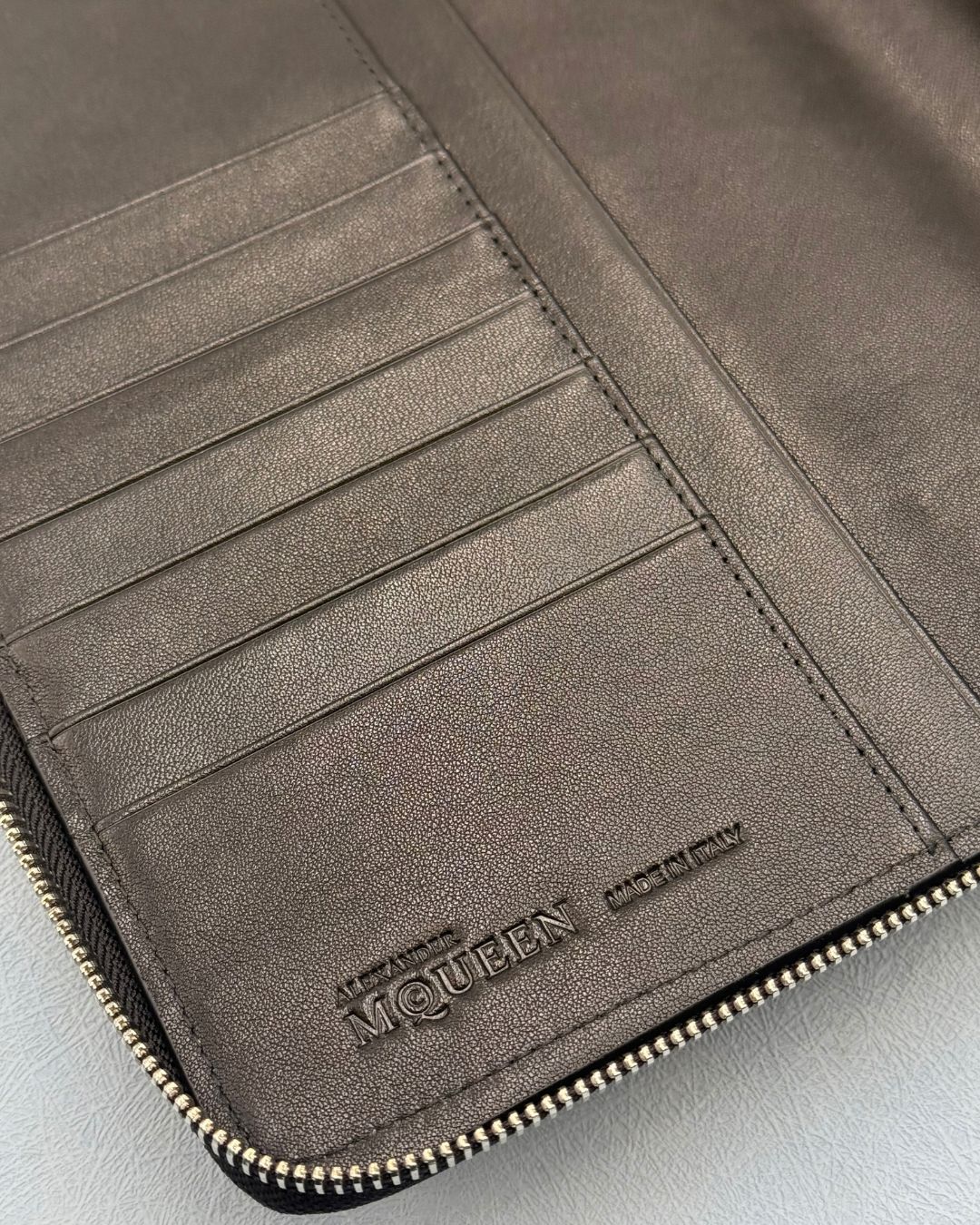 Made In & Logo Embossing inside ALEXANDER McQUEEN Skull embossed leather portfolio with silver-tone hardware