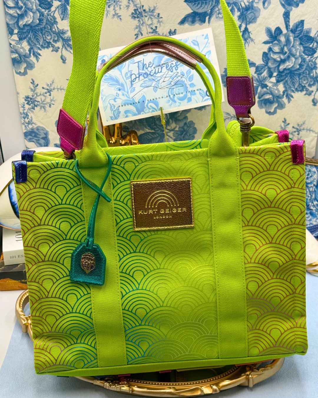 Front view of KURT GEIGER LONDON Southbank Tote Bag in lime canvas with rainbow print