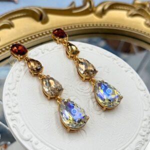 Front view of OSCAR DE LA RENTA Crystal Gallery Pear Drop Earrings