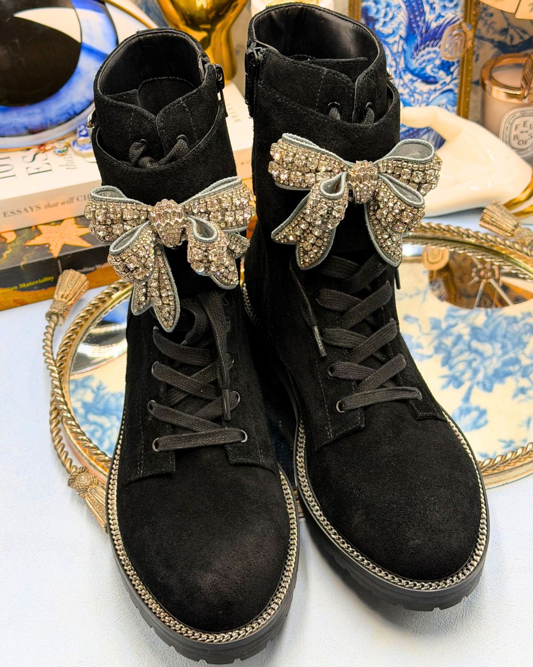 Top view of KURT GEIGER LONDON Sutton Bow Boots in black suede with crystal bows